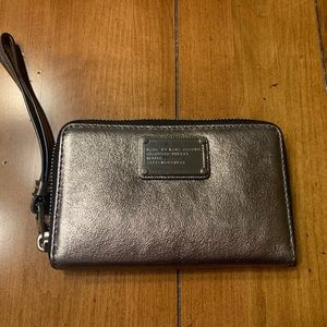Marc Jacob’s silver wrist wallet